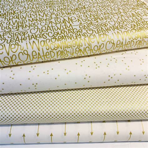 metallic gold fabric quilt|white fabric with gold metallic.